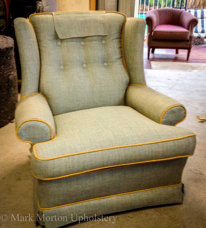 Green armchair upholstering finished