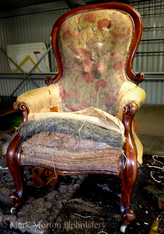 Gold armchair before upholstering photo