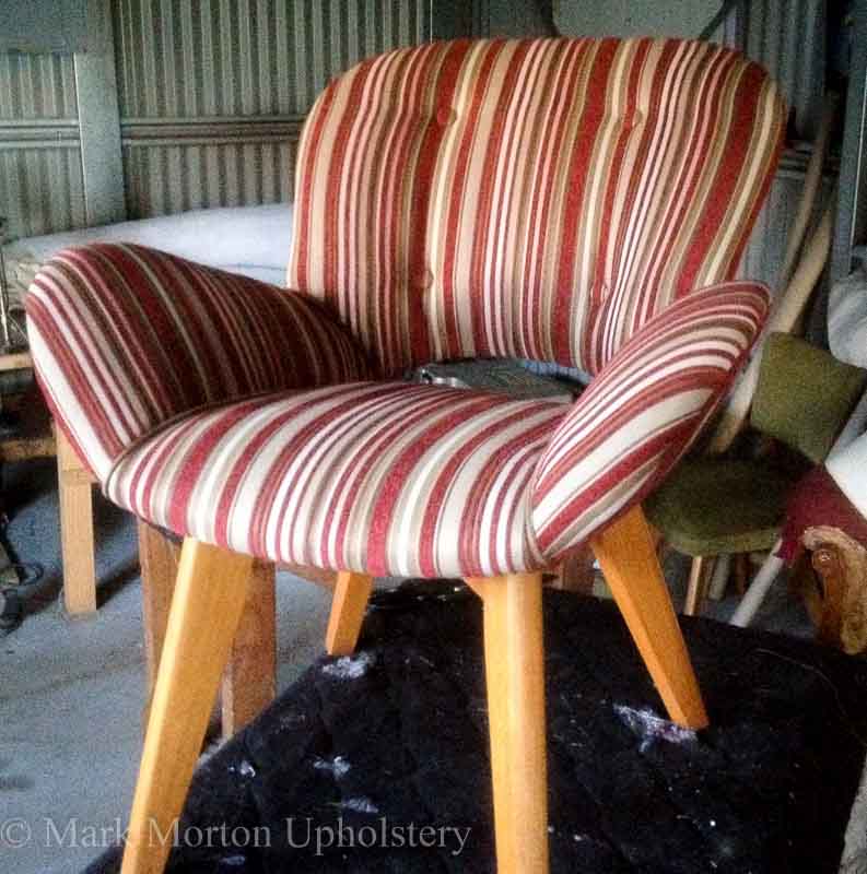 Striped chair upholstering finished